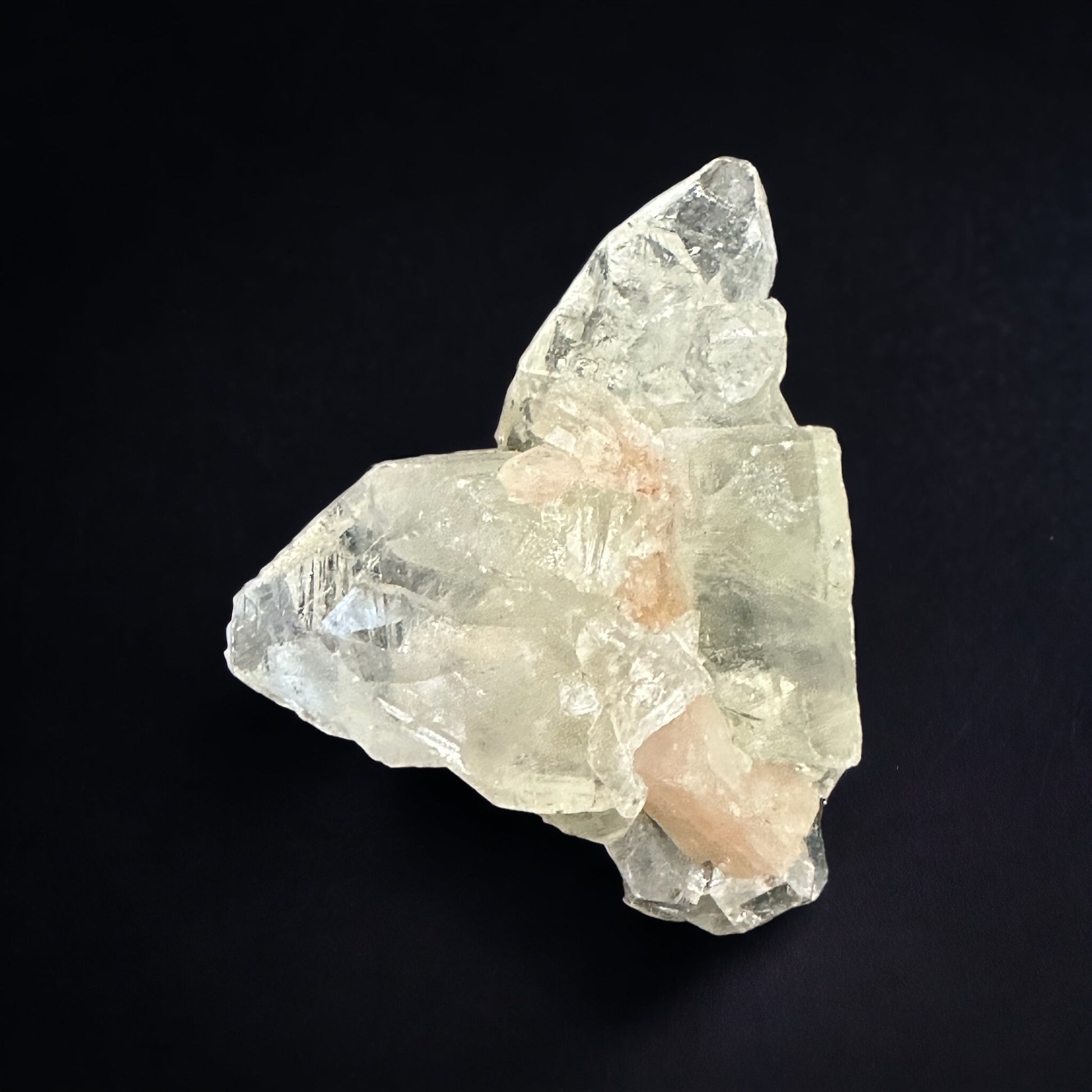 Apophylite with peach stilbite small crystal cluster.