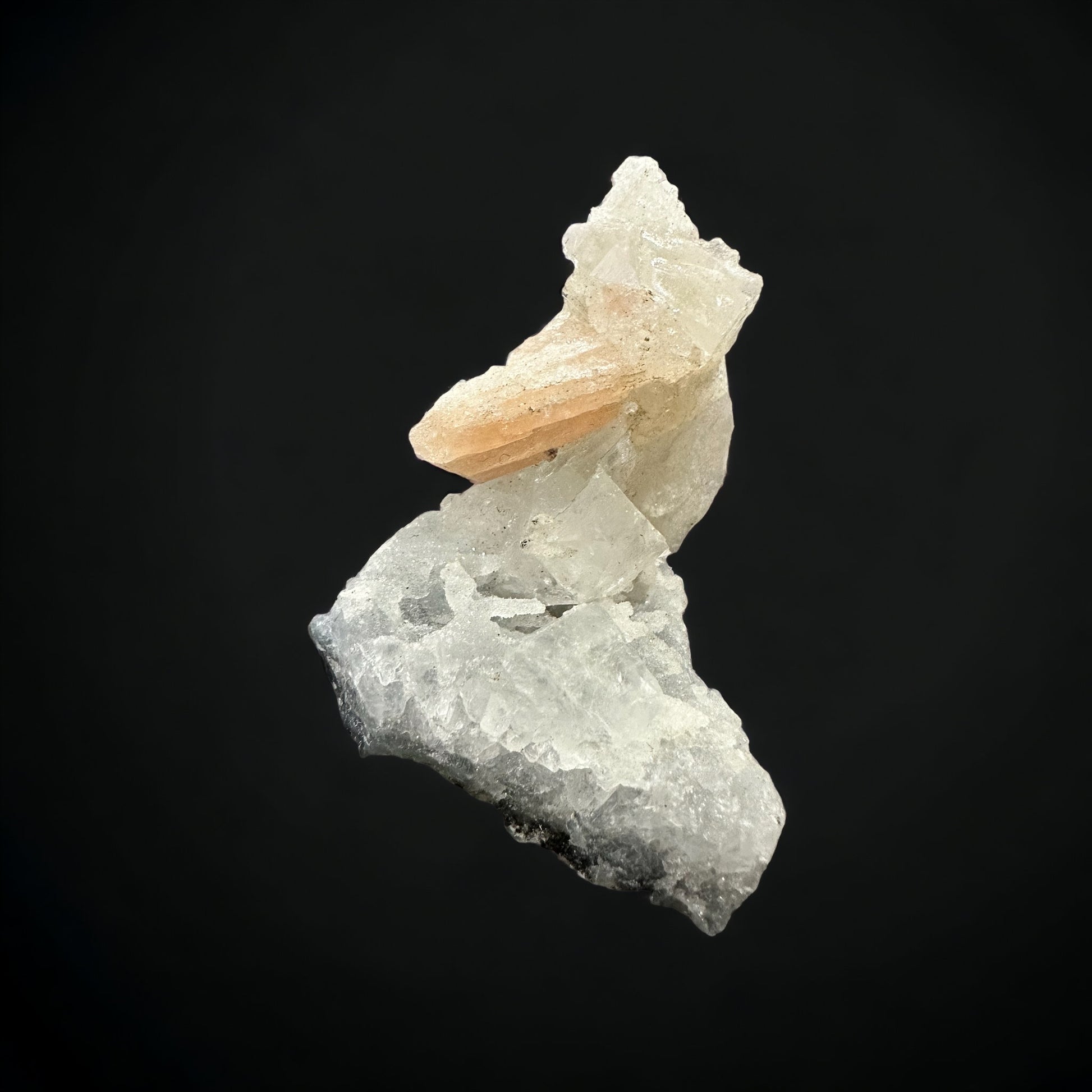 Apophylite with peach stilbite small crystal cluster.