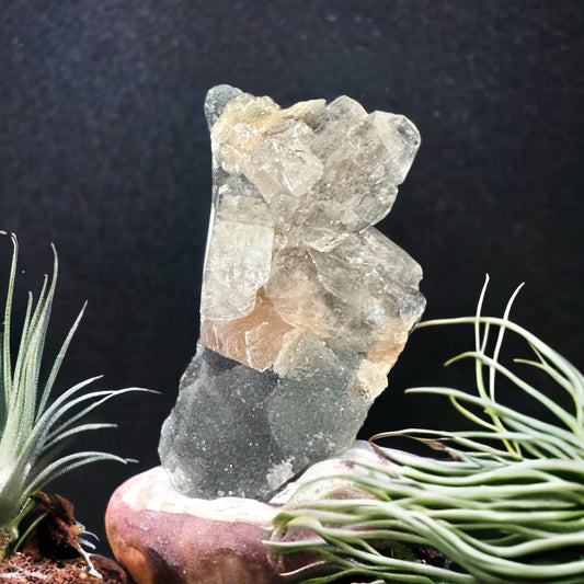 Apophyllite and peach stilbite crystal cluster.